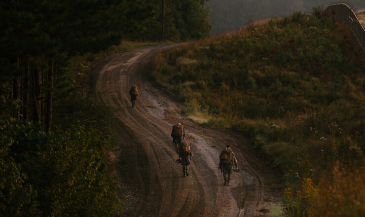 U.S. Marine Corps infantry officers with 2d Marine Division, conduct a 20-kilometer hike during the Division Leaders Assessment Program at Fort Walker, Virginia, Sept. 20, 2023. The program helps Marines improve their warfighting abilities through mentorship and learning opportunities, resulting in greater lethality and endurance. (U.S. Marine Corps photo by Cpl. Alexis Sanchez)