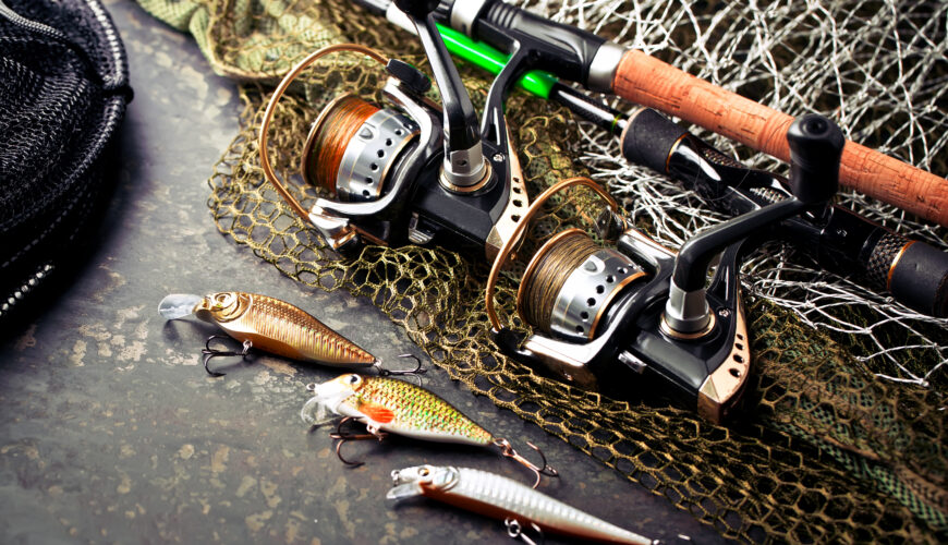 Fishing rods and spinnings in the composition with accessories