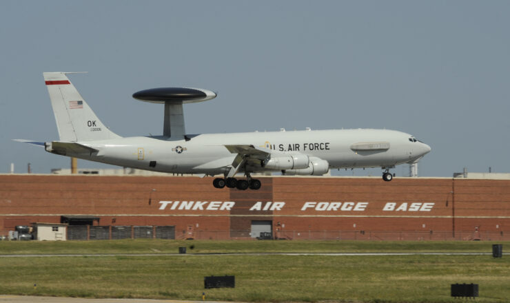A Boeing E-3G Airborne Warning and Control System aircraft on final approach to land June 16, 2017, Tinker Air Force Base, Oklahoma. The large building behind the E-3 AWACS is building 3001, a former Douglas Aircraft manufacturing plant during World War II, now used by the Oklahoma City Air Logistics Complex and its parent organization the Air Force Sustainment Center. The E-3 is operated by the 552nd Air Control Wing, Air Combat Command, from Tinker AFB where heavy maintenance of the E-3 airframe and engines is also conducted by the OC-ALC. (U.S. Air Force photo/Greg L. Davis)