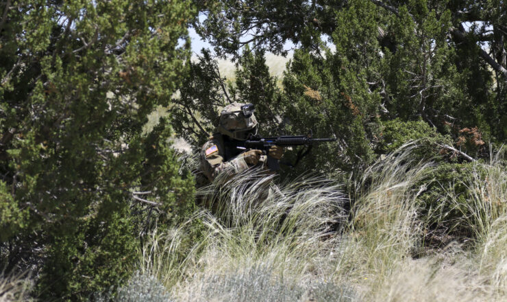 100th Missile Defense Brigade (GMD) Soldiers participate in a Situational Training Exercise at the Piñon Canyon Maneuver Site, near Trinidad, Colorado, June 13, 2019. The Soldiers conducted squad level movement, maneuver and assault operations using simulated rounds, aided by the 2-135th General Support Aviation Battalion of the Colorado Army National Guard, who provided one UH-60 Black Hawk helicopter for airlift and medevac training and operations. (U.S. Army National Guard photo by Staff Sgt. Zachary Sheely)