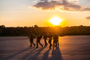 U.S. Marines and Sailors with Combat Logistics Battalion 5, Combat Logistics Regiment 1, 1st Marine Logistics Group, sleep in tents during Exercise Steel Knight 22 (SK-22) at Fort Hunter Liggett, California, Dec. 1, 2021. SK-22 is a 1st Marine Division led annual training exercise which enables the Navy-Marine Corps team to operate in a realistic, combined-arms environment to enhance naval warfighting tactics, techniques and procedures. (U.S. Marine Corps photo illustration by Lance Cpl. Mackenzie Binion)