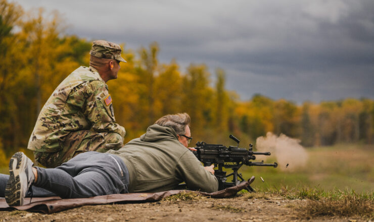 Chris Melby, a Pacers Sports & Entertainment sales director , fires a M249 squad automatic weapon during Indiana National Guard’s VIP Day at Camp Atterbury, Indiana, Friday, October 20, 2023. The VIP Guard Day helped show community partners that time spent in uniform is time well invested and makes soldiers and airmen better citizens