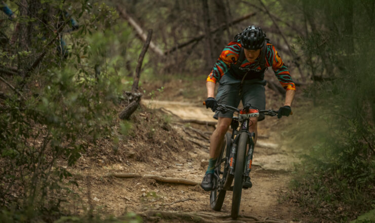 A participant rides a bike during the 2024 Quantico Epic hosted by the Quantico Mountain Bike Club on Marine Corps Base Quantico, Virginia, April 27, 2024. The Quantico epic gives regional riders an opportunity to ride along a trail system that is otherwise not open to the public. (U.S. Marine Corps photo by Lance Cpl. Ethan Miller)