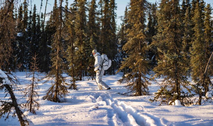 A Special Operations Forces Arctic Medic (SOFAM) conducts a long-range patrol on skis during medical training in the Arctic at Fort Wainwright, Alaska, Feb. 16, 2025. SOFAM 2025 enhanced U.S., Canadian, U.K. and interagency SOF readiness through real-world scenarios in an austere climate and ensures a lethal fighting force to win wars. Naval Special Warfare Group TWO produces, supports, and deploys the world’s premier maritime special operations forces to conduct full-spectrum operations and integrated deterrence in support of U.S. national objectives. (U.S. Navy Photo by Mass Communication Specialist 1st Class Trey Hutcheson)
