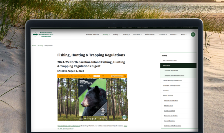 A computer showing hunting regulations for North Carolina